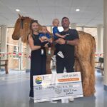 Zara and James Durham cheque presentation for Oakfest